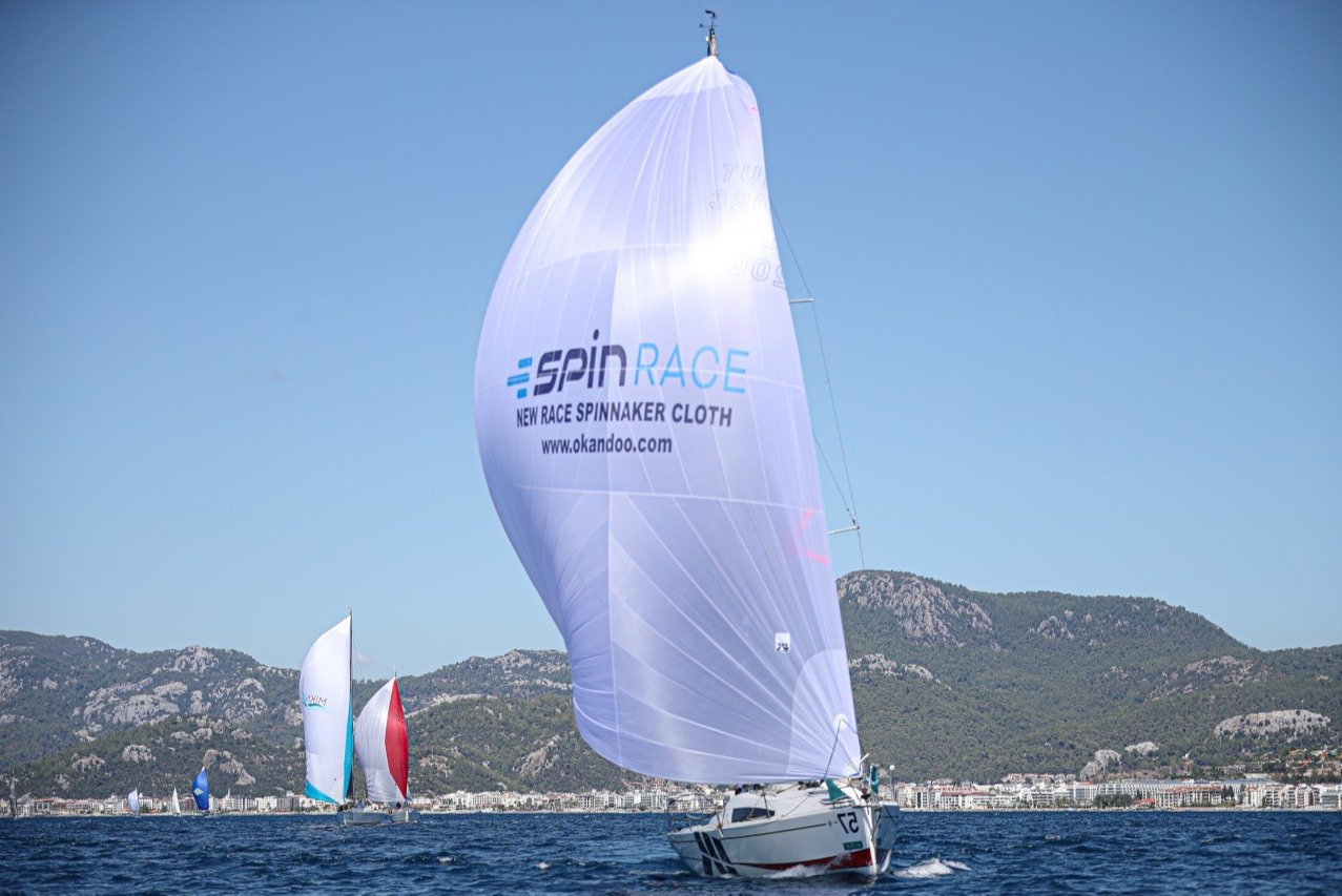 Boat sailing with spinnaker